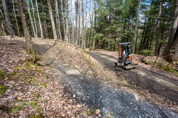 Bentley Outdoor Services heading up Dana Hill Road to finish Evolution II. Stoneblender, Bentley and Mad River Riders are working most days, if you want to help. Lots of rock to play with! Photo courtesy of Mad River Riders.