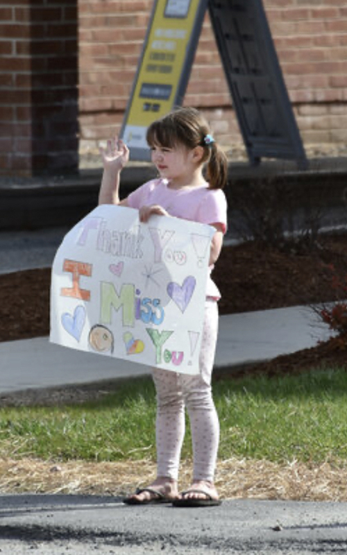 Teachers and students reconnected from afar during ‘We miss you’ parade in Waterbury