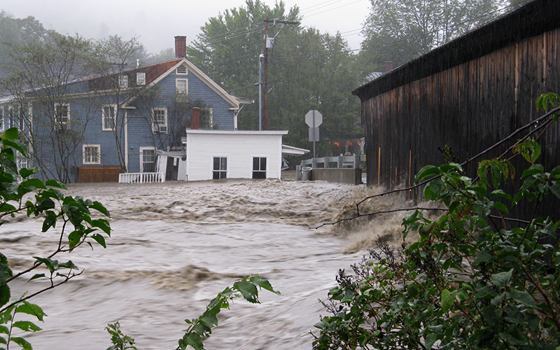 Flooding on the Mad River in Waitsfield, VT at the historic covered bridge. Photo: Jeff Knight