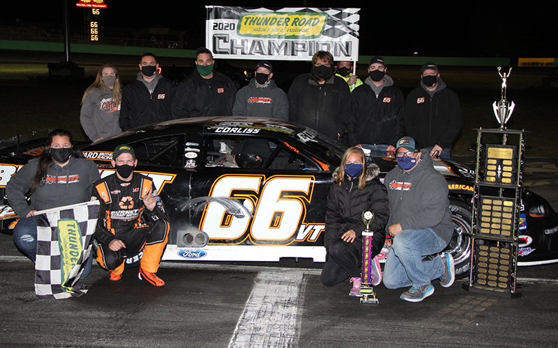 Barre's Jason Corliss (front near right) celebrates his second straight "King of the Road" title with his team and family after winning the Barre Granite Association main event. Alan Ward photo