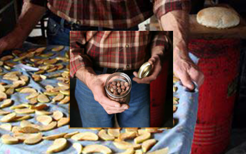 Richard Czaplinski with dried fruit and jarred nuts.