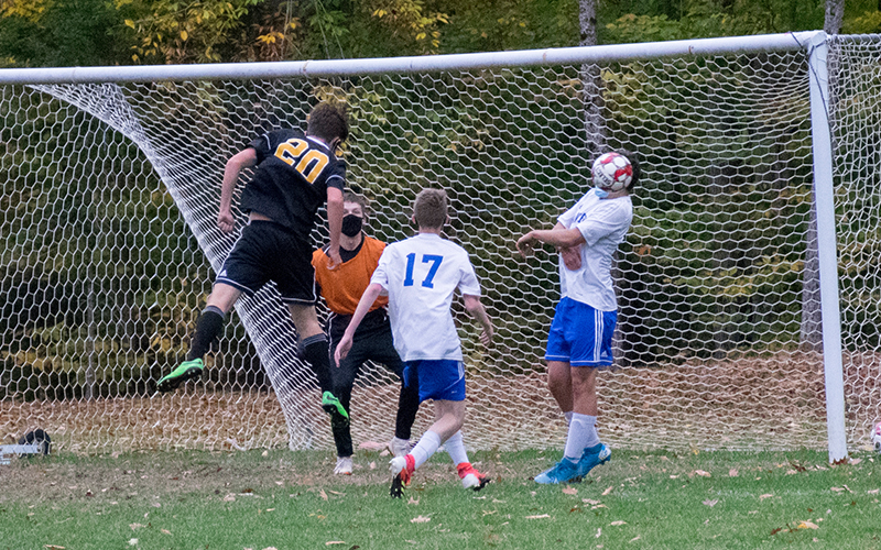 Nicolas Moran attempts a header during the first half of Tuesday's match against Thetford Academy. Harwood won 4-0. Photo: Jeff Knight