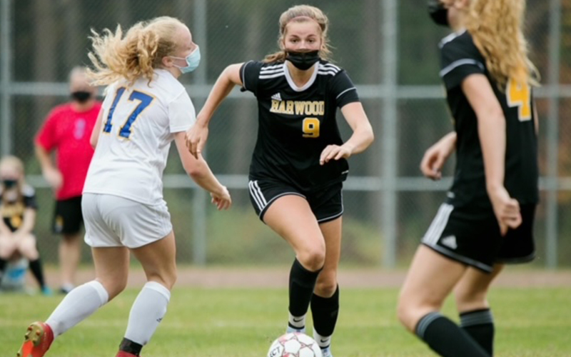 Louisa Thomsen #9 determined to shoot against Lyndon. Harowwd won 10-0. Photo: Ellett Merriman