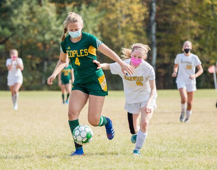 Tela Haskell #6 is defending the ball against People’s Academy. Harwood won 6-1. Photo: Ellett Merriman. Tela Haskell #6 is defending the ball against People’s Academy. Harwood won 6-1. Photo: Ellett Merriman.