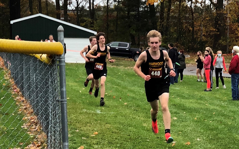 Despite a wrong turn and extra mileage on the unmarked Rice Course, Carlton Cummiskey turned on the afterburners to finish third in the meet, followed closely by Rye MacCurtain and Luke Groom. The Highlanders prevailed over a strong Division 1 Essex team. Photo: Bob Cummiskey.