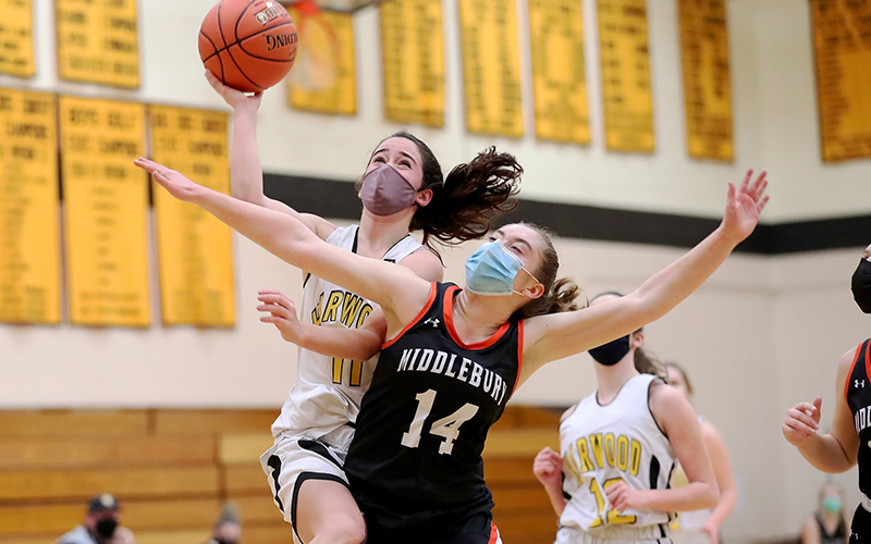 Harwood’s #11, Sarah Bartolomei, goes up for the shot in a game against Middlebury. Middlebury came away with the win, 45-39. Photo: Sarah Milligan.