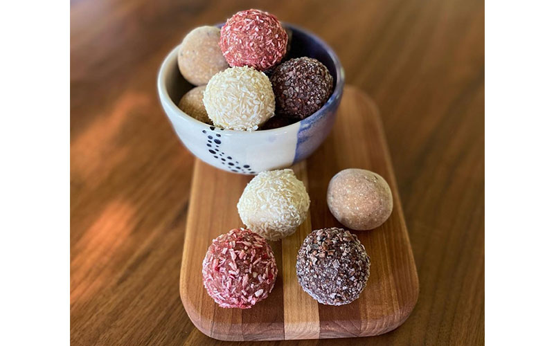 Nude Food Co. specializes in organic, plant-based treats from nut-based "bliss balls" to cashew "cheeze" cakes. Photo courtesy of Nude Food Co.