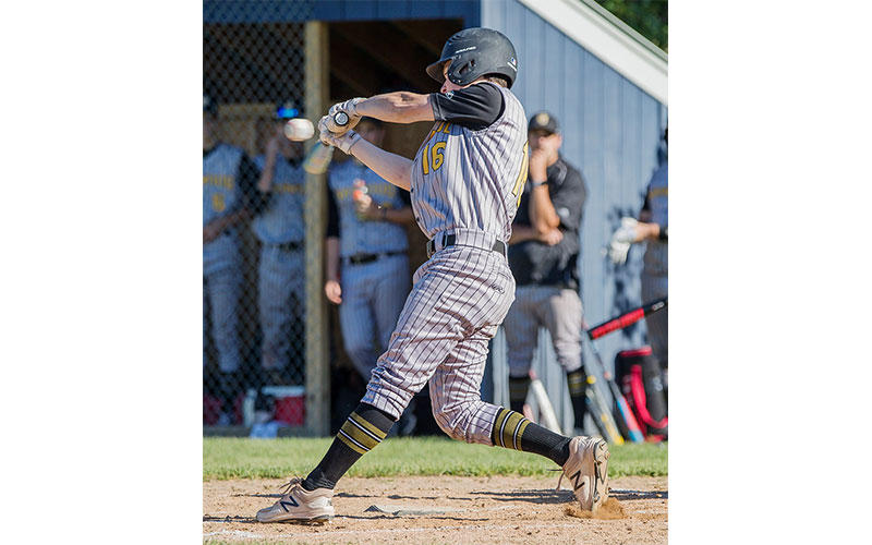 Skylar Platt connects with the ball in a May 29 game against Randolph. Photo: Sarah Milligan.