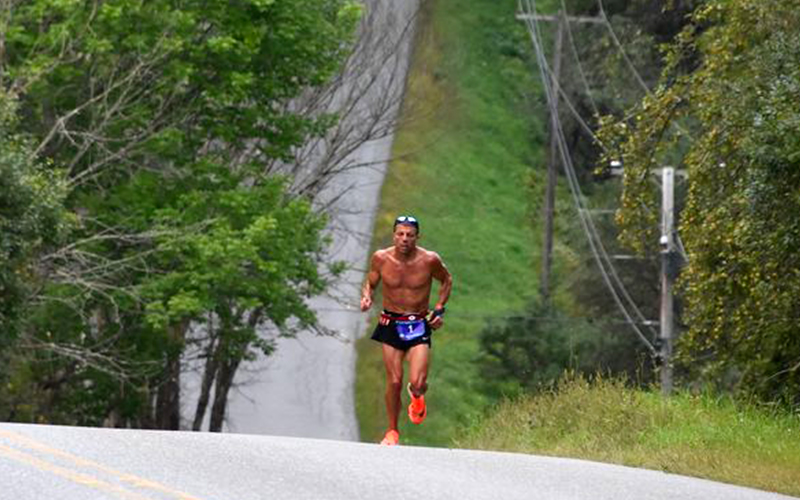 Runner coming up the 'Dip' along the East Warren Road. Photo: Phil Bobrow