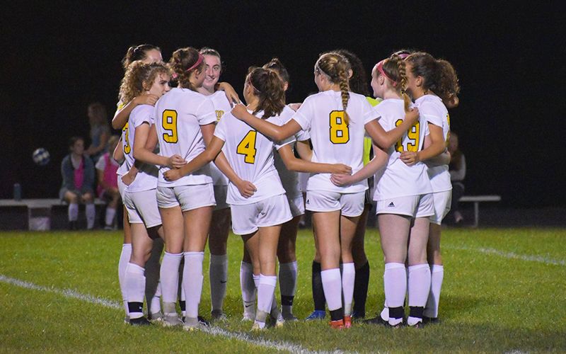 Harwood Girls' Soccer team prepare for kickoff. Photo: Lorne Thomsen