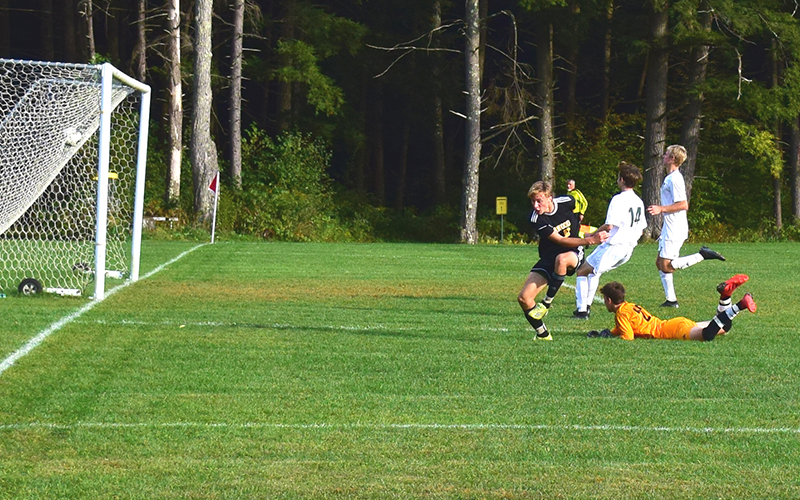 Jordan Schullenberger scores Harwood's first goal against Montpelier on Tuesday. Photo: Jeff Knight