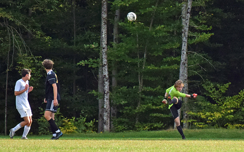 Harwood goalie Liam Combs clears the ball against Montpelier on Tuesday. Photo: Jeff Knight
