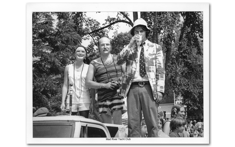 Chris Pierson, right, dressed as The Commodore in the Fourth of July parade.