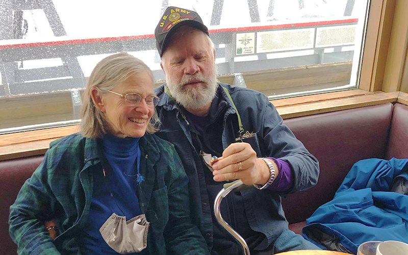 Stephen Goss shows his long lost and recently found class ring to his wife Martha. Photo by Lisa Loomis