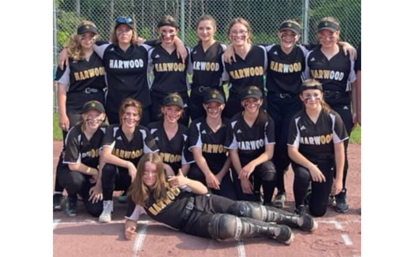 Team photo of the undefeated Harwood Middle School Girls' Softball team.