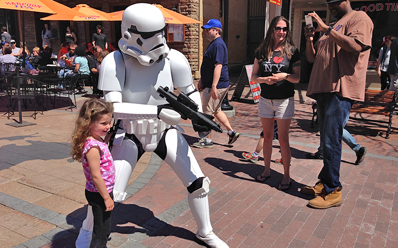 Andrew Liptak cosplaying and interacting with the public as a Star Wars Stormtrooper.