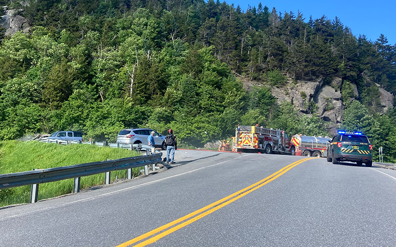 Fire and police at the scene of a car fire at the top of the Appalachian Gap in Fayston, VT. Photo: Jean Hubbell 