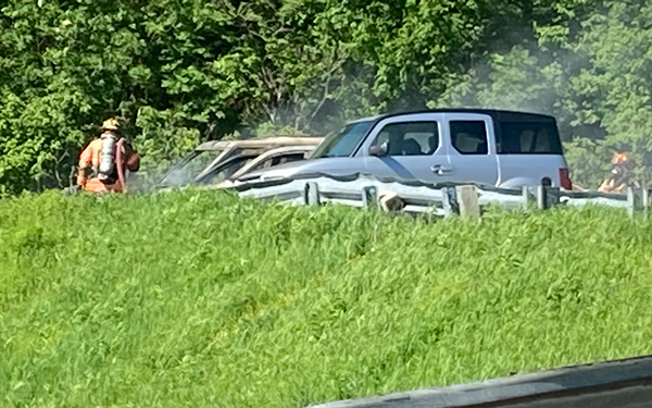 Fire crews work to save cars adjacent to a car on fire at the top of the Appalachian Gap on Monday, June 13. Photo: Jean Hubbell Fire crews work to save cars adjacent to a car on fire at the top of the Appalachian Gap on Monday, June 13. Photo: Jean Hubbell