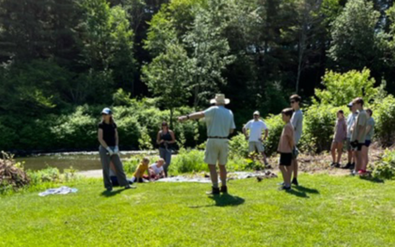 Mysa School students pitch in to manage knotweed