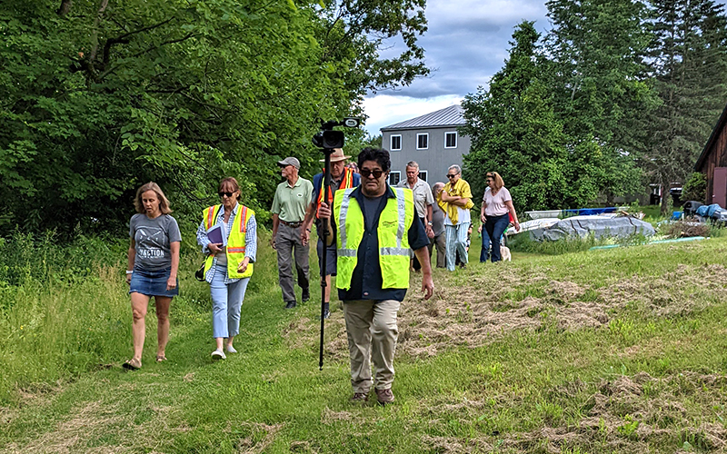 Tony Italiano of MRVTV walks with citizens as they survey the new VOREC funded path system in Waitsfield, VT. Photo: Erika Nichols-Frazer