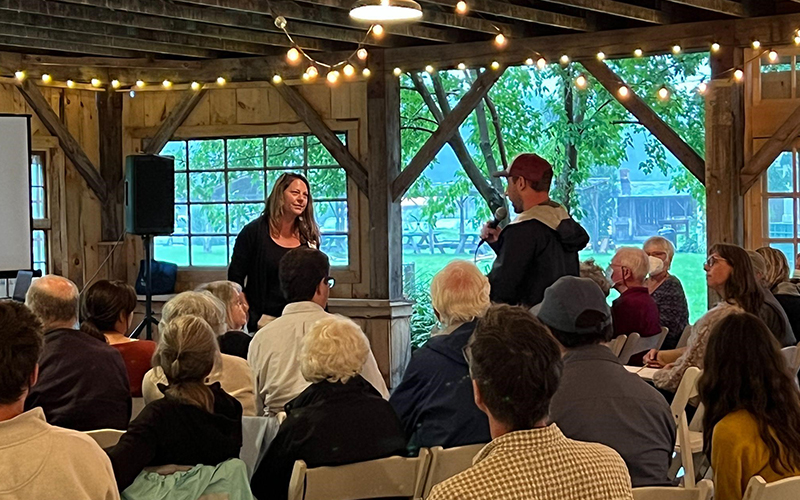 Heather Furman takes a question from a Community Climate Chat audience member at the first community climate chat. Photo: Josh Schwartz