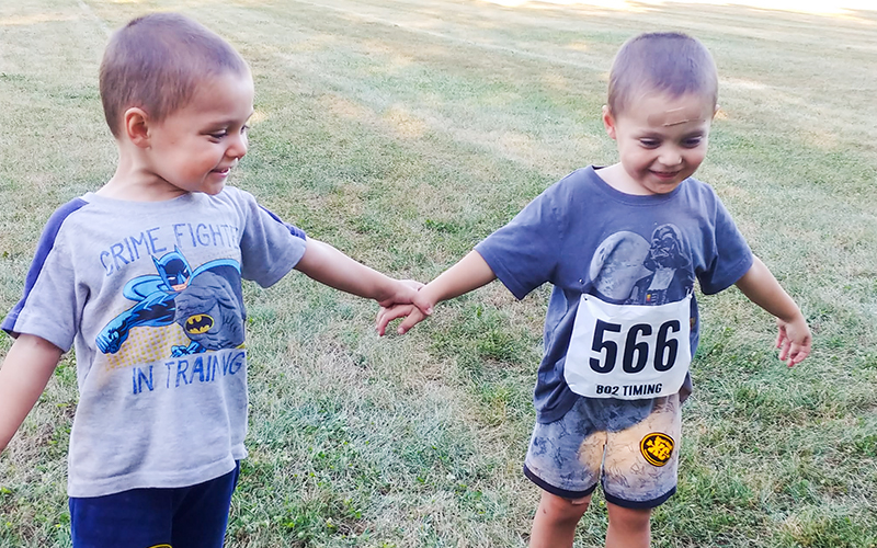 Left is Ethan Dabowski and right is Grant Dabrowski - identical twin two year - olds placed first and second in Kids  Fun run  