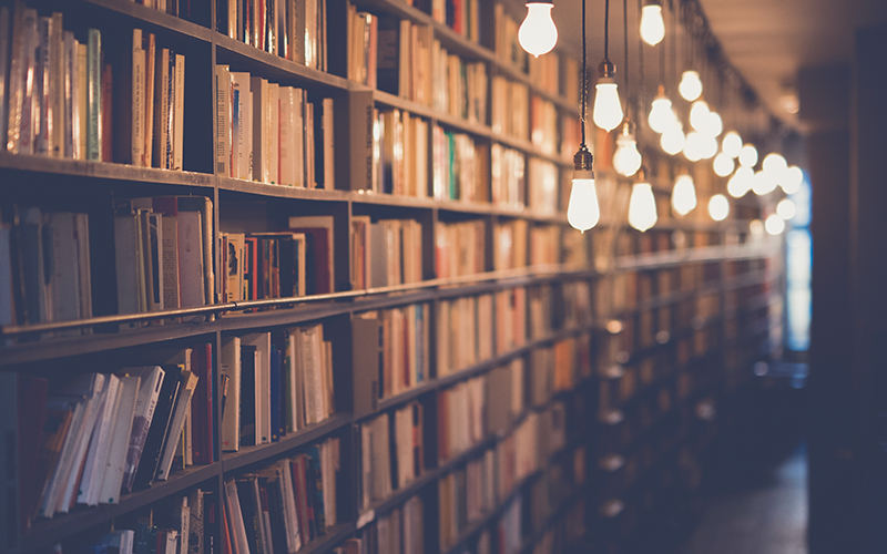 Shelves of books fading to the distance.