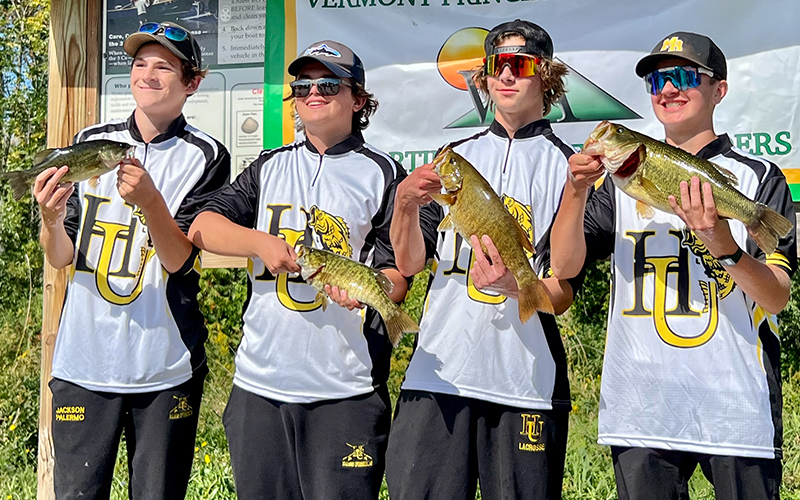 Harwood Bass Fishing team of Sean Geary, Nate Conyers, Jackson Palermo, and Caleb Durand holding their catch at weigh-in. 