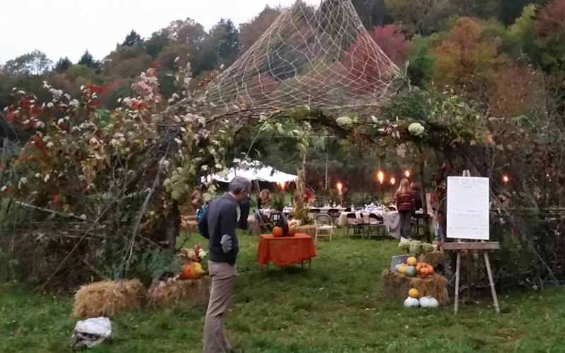 An illuminated tent in a field for Sukkot. Phot courtesy Living Tree Alliance