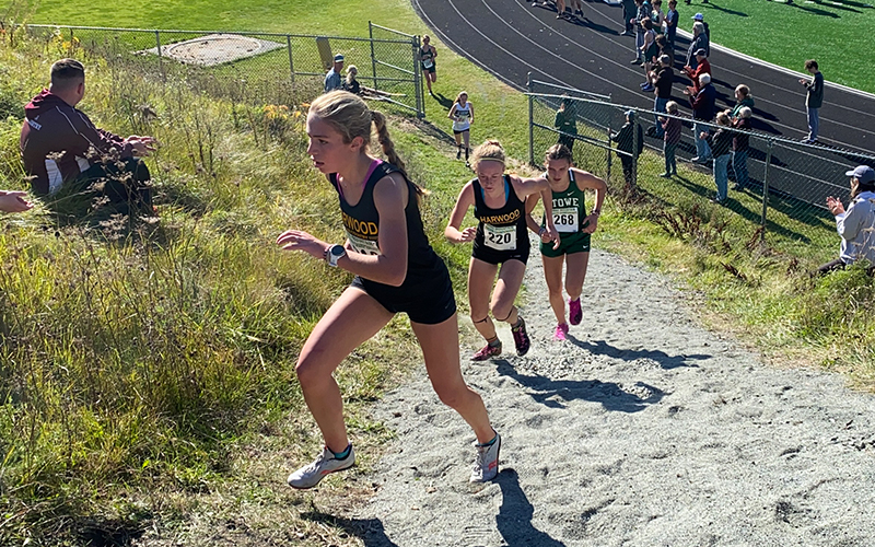 Harwood's Charlie Flint and Julia Thurston tackle an uphill section. Photo: Robert Cummiskey