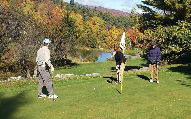 Vince Gauthier, Ted Joslin, and John Reilly on hole No. 2 “Mary Jane" at the Woodchuck Golf Course.