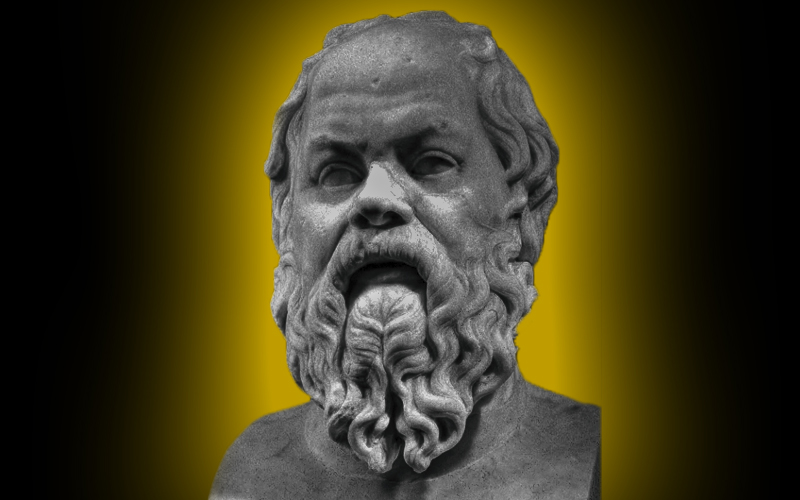 Socrates sculpture glowing gold and black