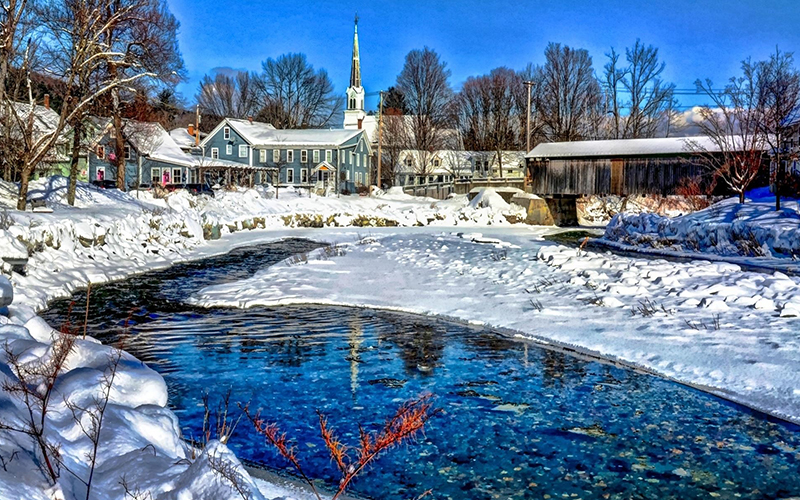 Phil Bobrow's winter photo of the Waitsfield Covered Bridge and Mad River