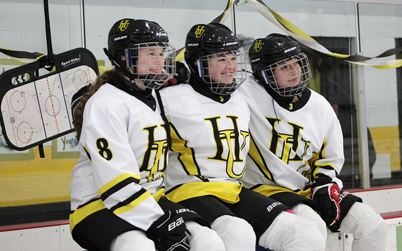 Harwood Gilrs' Hockey seniors Captain Lindsey Bigelow, Erin Elwell and Kai Mcgrath.