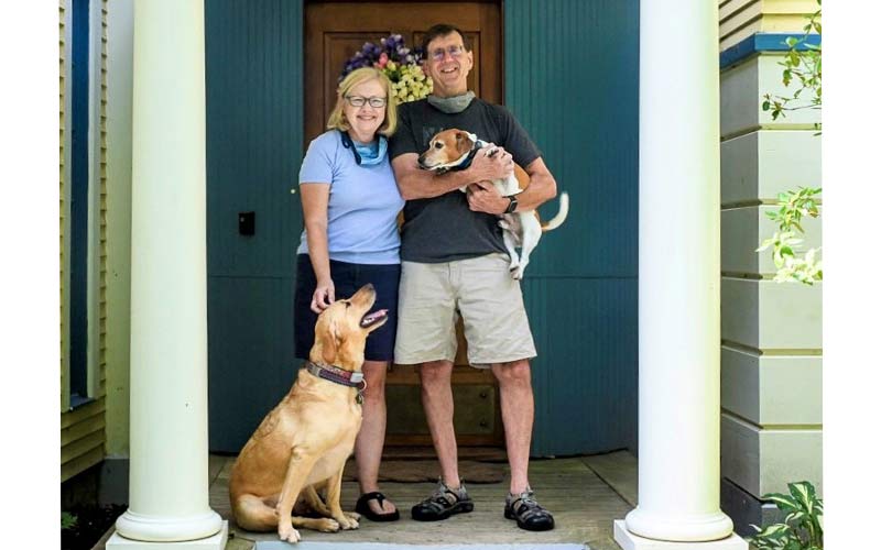 Peter Colgan with wife Susan and dogs Marley (Lab/golden mix) and Buster (Jack Russell).