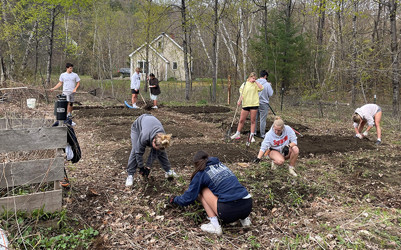 GMVS students planting a community garden as part of their class studies.