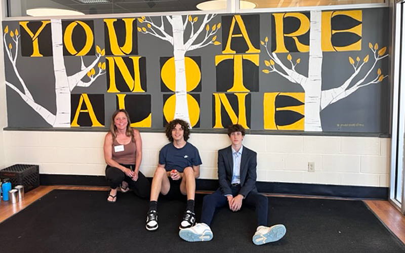 Left to right: Artist Allyson Biondo and students Cam'ron Washington and Trent Jordan. Courtesy photo. 