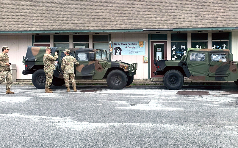 National Guard members stopped in Waitsfield Tuesday morning on their way to assist in flood recovery in Berlin area. Photo: Genevieve Knight