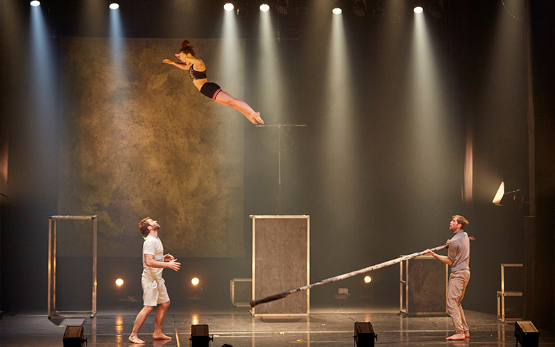 Alexandra Royer jumping from Eric Bates toward Mason Ames. Photo: Martin Hauer