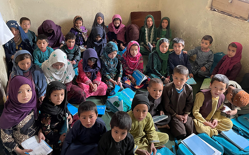 Afghan students learning at a school built by Direct Aid International