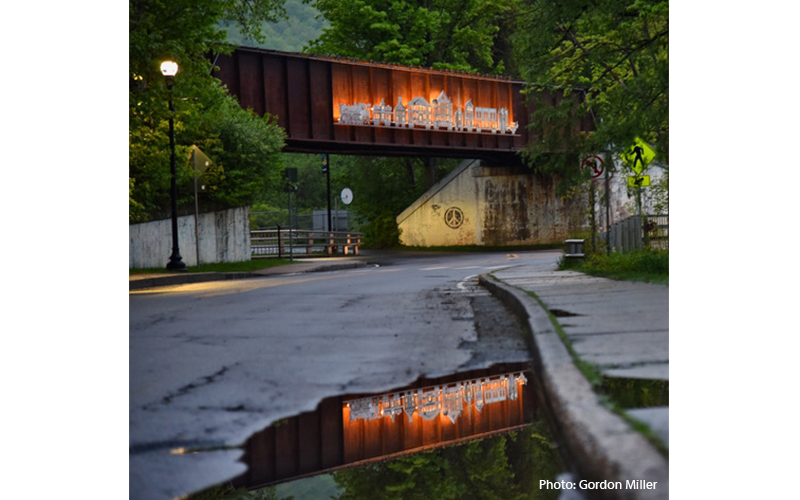 Reflection of train bridge in Waterbury, Vermont. Photo by Gordon Miller