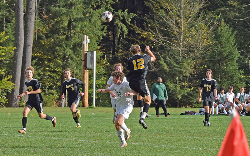 Harwood's Steele Nelson heads a ball into the box for a first-half shot on goal. Photo: Jeff Knight