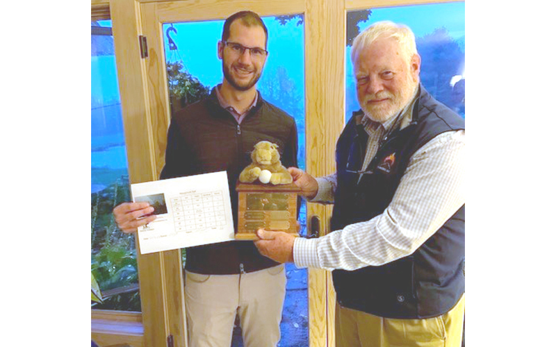 Woodchuck Golf Tournament winner Alexander Socinski and course owner Spencer Potter.  