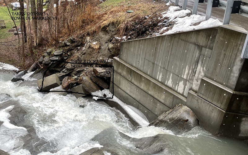 Flooding has exposed a wastewater tank along Bradley Brook in warren, VT. Photo: Bob Ackland