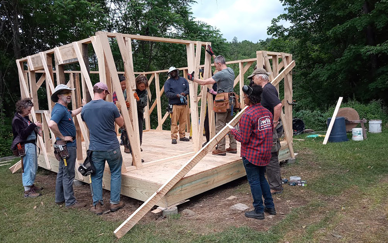 File photo of Yestermorrow constructing a small building.