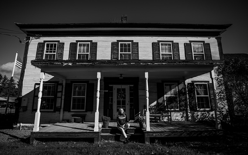 Mary Kathleen Mehuron in front of the Wait House in Waitsfield, Vermont. Photos by Kintz