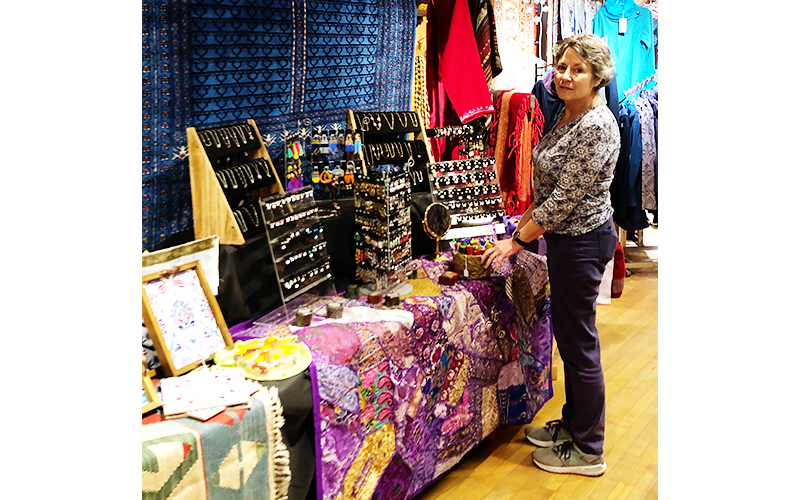Amurtel president Joni Zweig checks out the details of this year’s International Boutique, a fundraiser for Amurtel. 