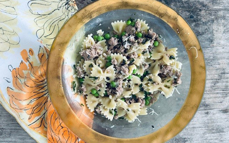 Pasta with ground pork, peas, and mint