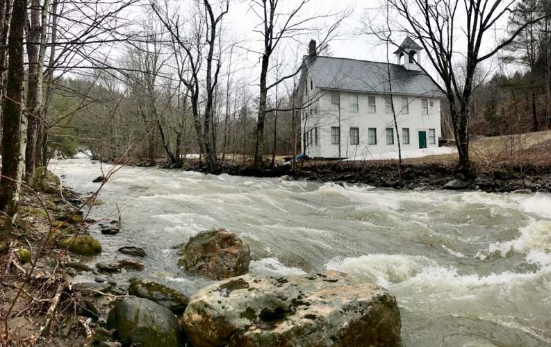 Fayston’s Number Nine Schoolhouse as seen from the Mill Brook. Photo Kevin Russell