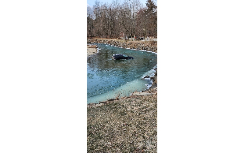 Car in River   Erica Stroem